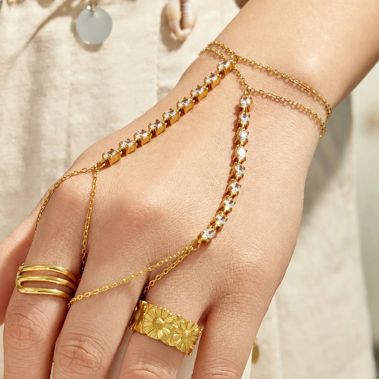 Sleek Gold-Plated CZ Wave Finger Chain Bracelet