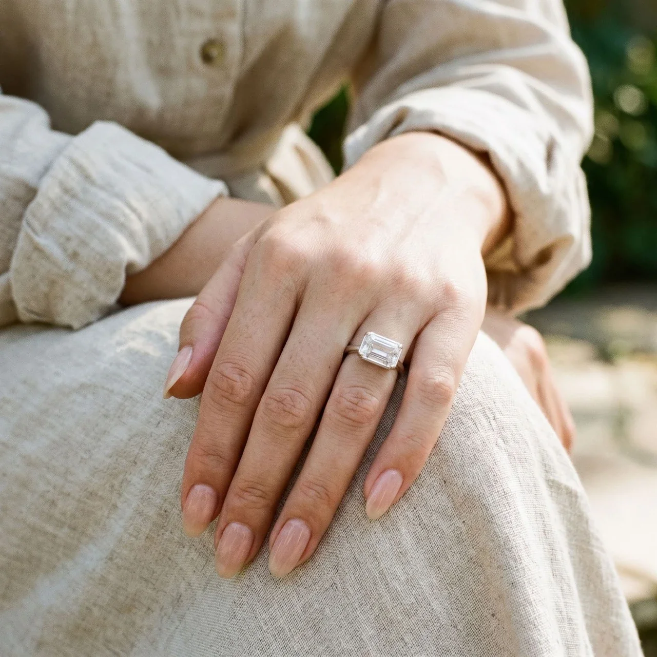 Refined Copper Emerald-Cut Four-Prong Solitaire Ring
